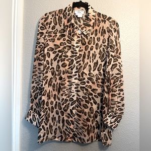 See true leopard print blouse size S.